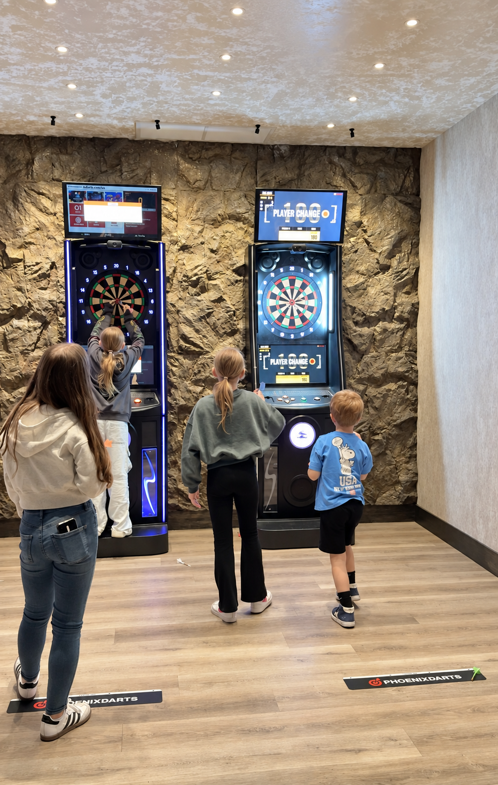 Children playing electronic darts at SET